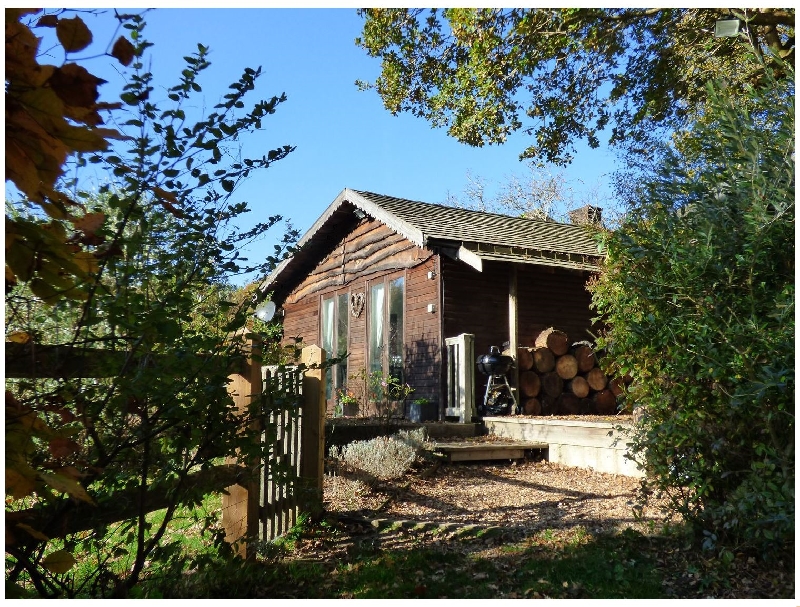 Click here for more about Woodmancote Lodge